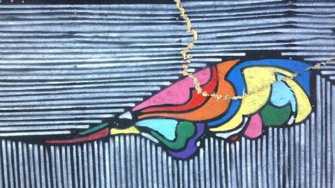 Boarded up - graffiti on a boarded up door.jpg