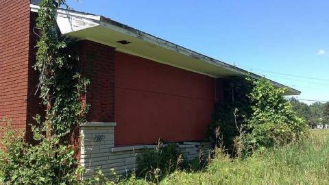 Boarded up - the house from an angle.jpg
