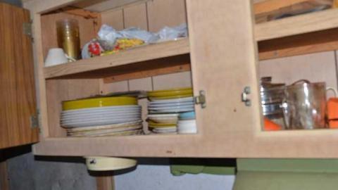 Burlington Hoarder - Hoarders-Trash-Heap36.jpg