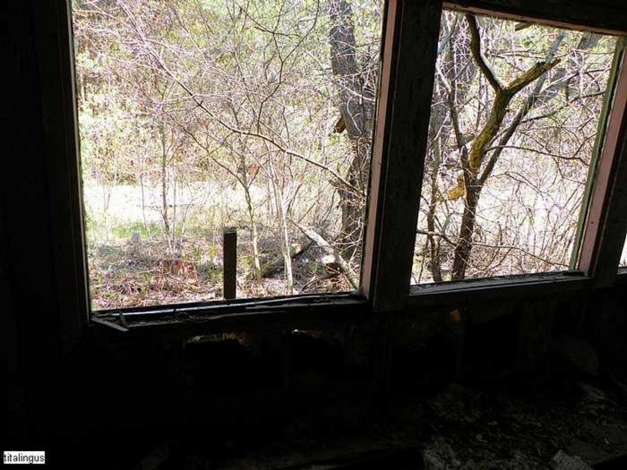 Nature blowing holes in this o - SAM_1114.jpg