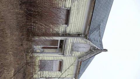 Photo from yellow farm house and barn 