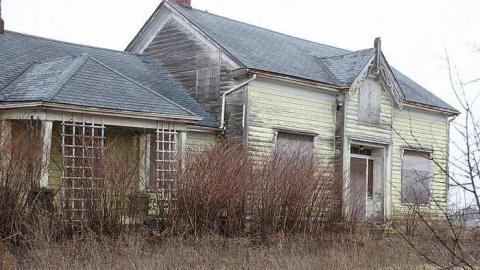 Photo from yellow farm house and barn 