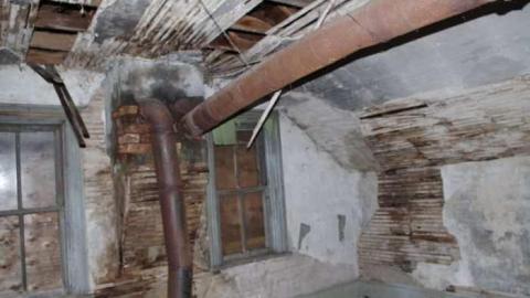 Fenel Rd home interior views - Heating pipes in upstairs room.jpg