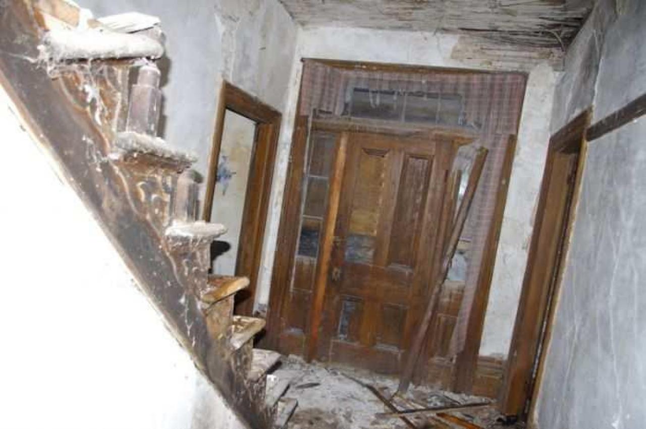 Fenel Rd home interior views - Main stair and front door.jpg