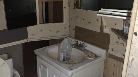 House beside a Cemetery photo 2