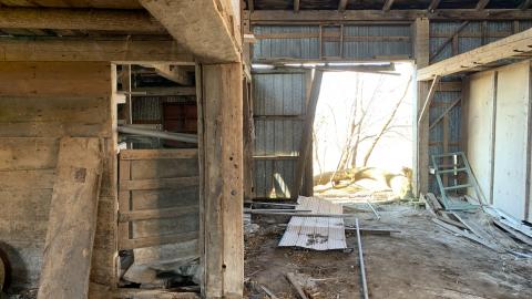 Long abandoned horse barn photo 3