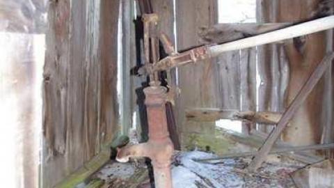 Fenel Rd home exterior views - Fenel Rd home pump.jpg