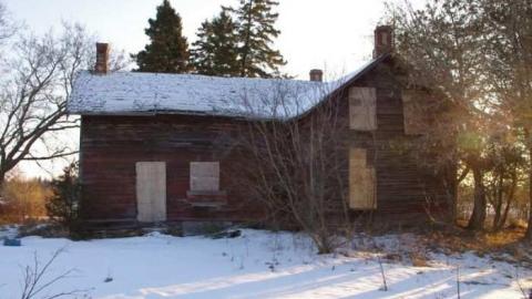 Fenel Rd home exterior views - Fenel Rd home west wall.jpg