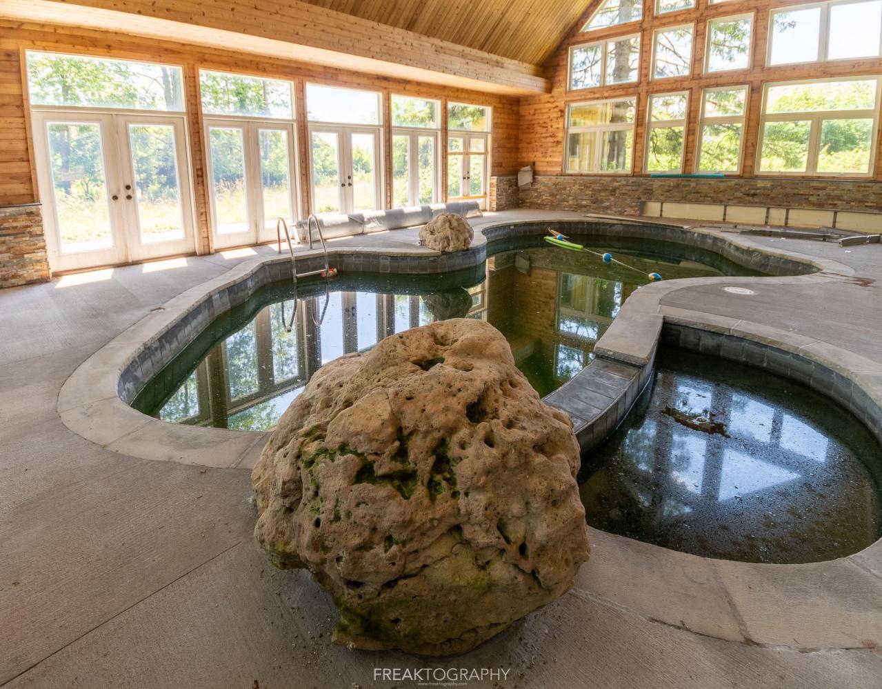 2019 - London Ontario Abandoned Mansion pool rock.jpg