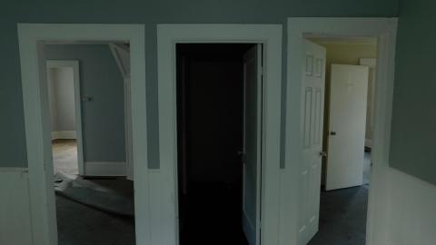 Kitchen on main floor, dining room to the left, basement in the middle and bedroom to the right.