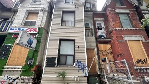 Photo from Abandoned row full of buildings