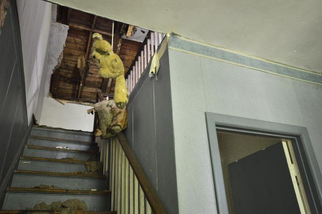 Abandoned House with an Active House photo 2
