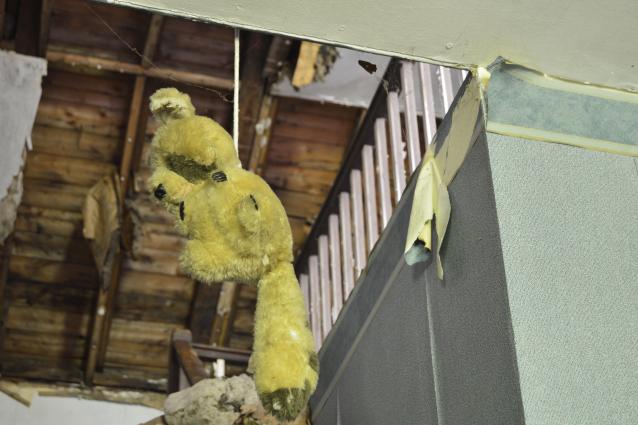 Abandoned House with an Active House photo 3