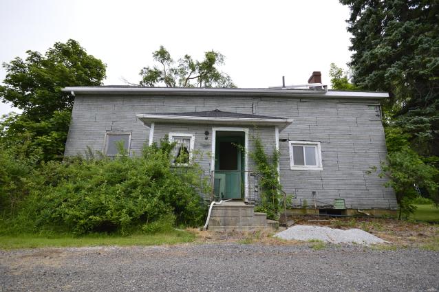Abandoned House with an Active House photo 4