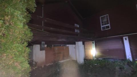 Front exterior balcony of House 1