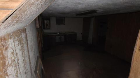 A bedroom inside House 2