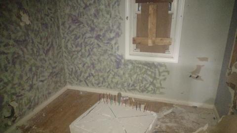 A random pillow thing with pencil crayons sticking out of it