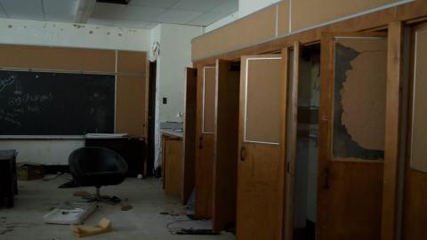 A line of cupboards decorated with cork