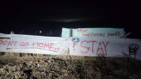 Fence around the back of the farmhouse?