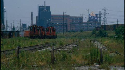 Before It Was Abandoned - Train cars on West Don Lands looking east.jpg