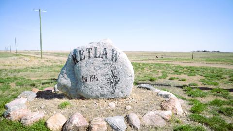 A rock with the words "Retlaw Est. 1913" printed on it