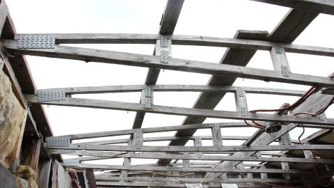 One of the trailers, ceiling and roof are completely gone