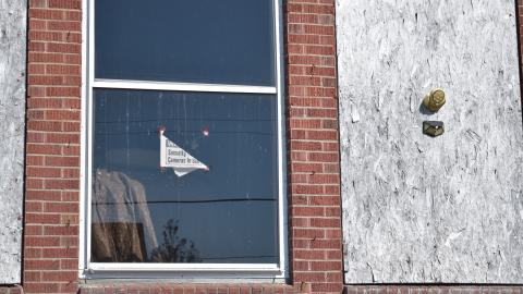 You can see a falling security camera sign