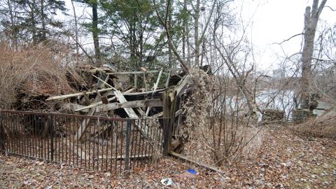 Side view of shack + well and chimney on the right