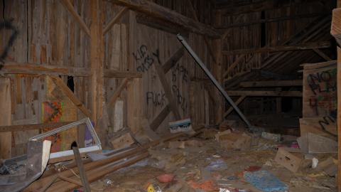 A wide shot of the empty portion of the barn