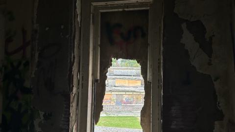 looking into the gated building