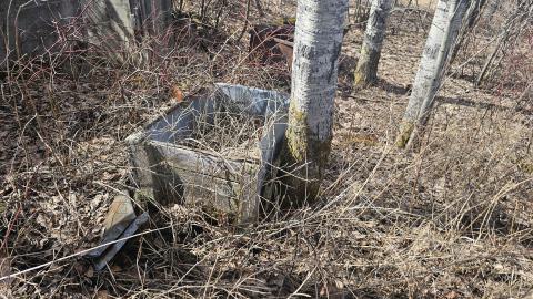 Old debris outside of the entrance of the concrete cook house