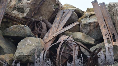 Looks like parts of a cart or maybe a crane setup