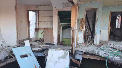 a large sinkhole full of water