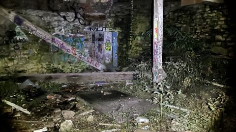 Beneath the room with no floor.