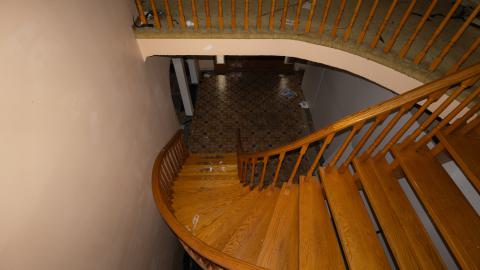 Looking to front entryway from upstairs