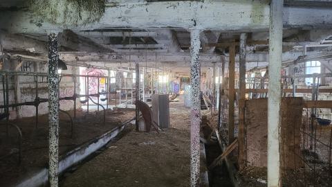 The cattle barn is quite large, with pens along the entire first floor.