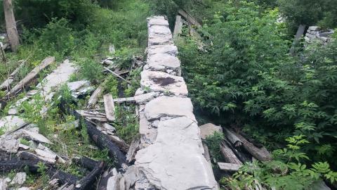 Charred logs from fires set in the house by other people