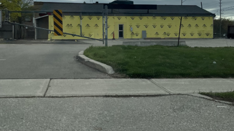 Front Of The Building With Glass Door