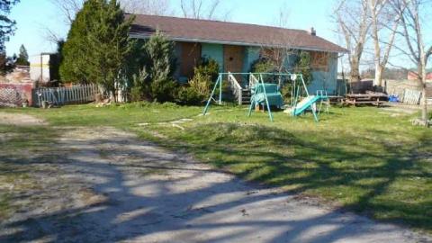 Photo from 2 houses, 2 chevy