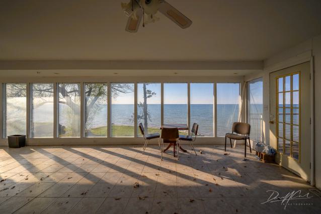 "You need your art spoon-fed to you" - Abandoned Waterfront Home With Artwork Left Behind-1.jpg