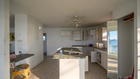 "You need your art spoon-fed to you" - Abandoned Waterfront Home With Artwork Left Behind-5.jpg