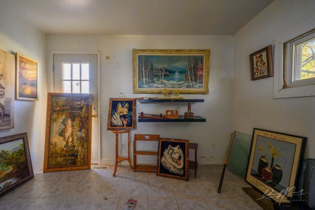 "You need your art spoon-fed to you" - Abandoned Waterfront Home With Artwork Left Behind-9.jpg