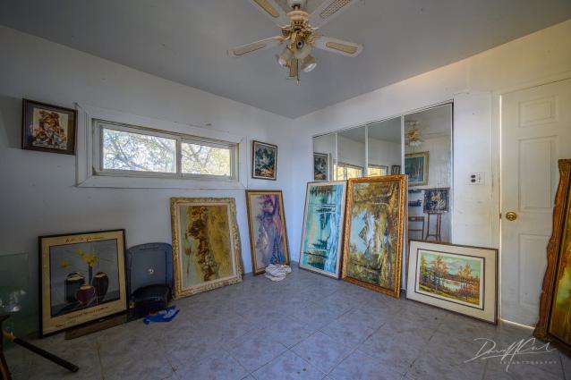"You need your art spoon-fed to you" - Abandoned Waterfront Home With Artwork Left Behind-15.jpg