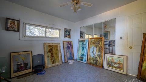 "You need your art spoon-fed to you" - Abandoned Waterfront Home With Artwork Left Behind-15.jpg