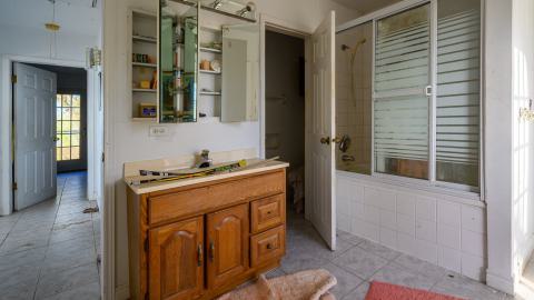 "You need your art spoon-fed to you" - Abandoned Waterfront Home With Artwork Left Behind-18.jpg