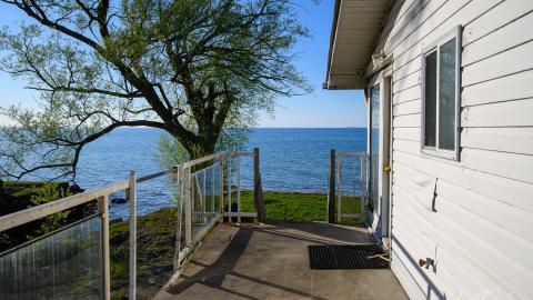 "You need your art spoon-fed to you" - Abandoned Waterfront Home With Artwork Left Behind-25.jpg
