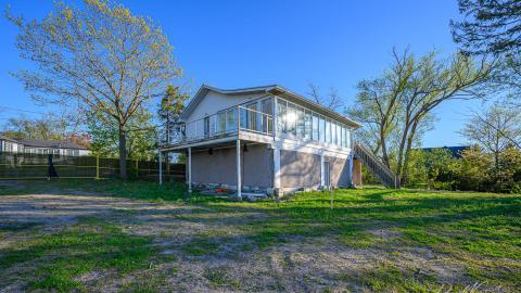 "You need your art spoon-fed to you" - Abandoned Waterfront Home With Artwork Left Behind-33.jpg