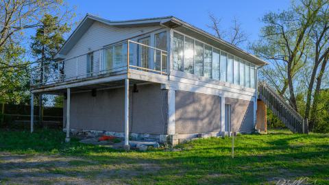 "You need your art spoon-fed to you" - Abandoned Waterfront Home With Artwork Left Behind-34.jpg