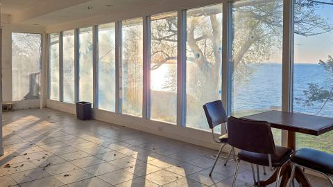 "You need your art spoon-fed to you" - Abandoned Waterfront Home With Artwork Left Behind-41.jpg