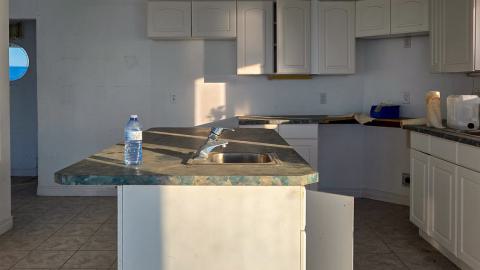 "You need your art spoon-fed to you" - Abandoned Waterfront Home With Artwork Left Behind-43.jpg